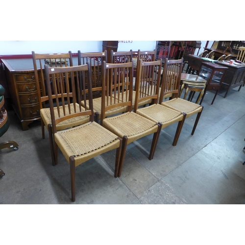 77 - A set of eight Danish Mogens Kold teak dining chairs, designed by Arne Hovmand Olsen