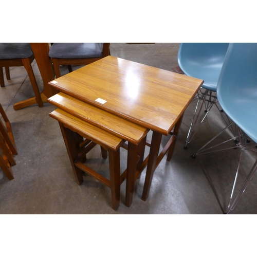 82 - A teak nest of tables