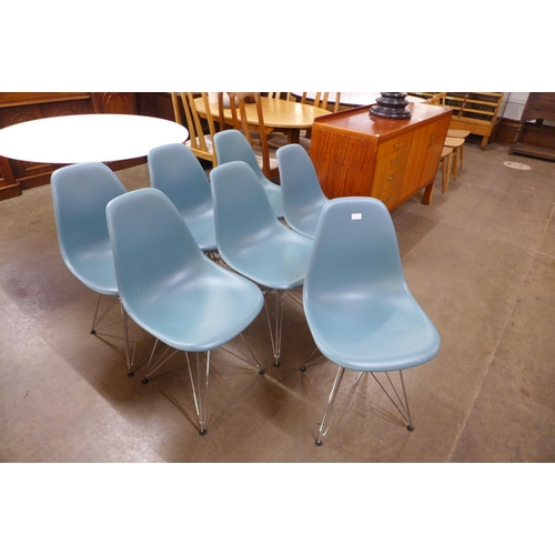 83 - A set of seven Charles & Ray Eames chrome and perspex Vitra chairs