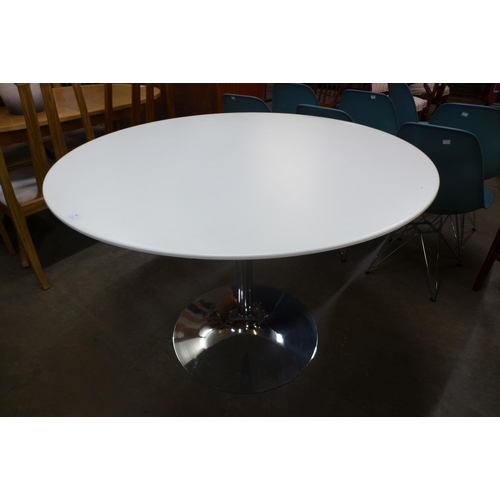 84 - An Eero Saarinen style chrome based circular dining table