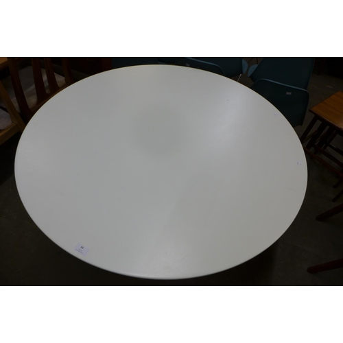 84 - An Eero Saarinen style chrome based circular dining table