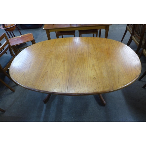 90 - A G-Plan Fresco teak extending dining table