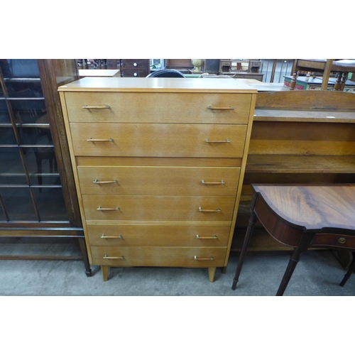 92 - A light oak chest of drawers