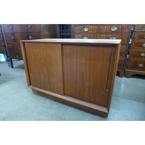 95 - A teak two door cabinet