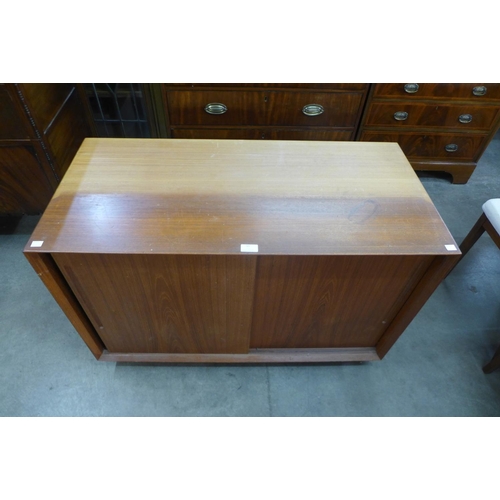 95 - A teak two door cabinet