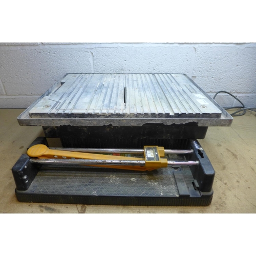 2012 - Electric tile cutter and manual tile cutter