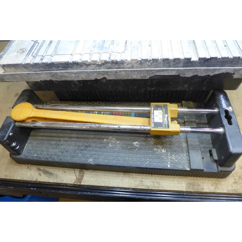 2012 - Electric tile cutter and manual tile cutter