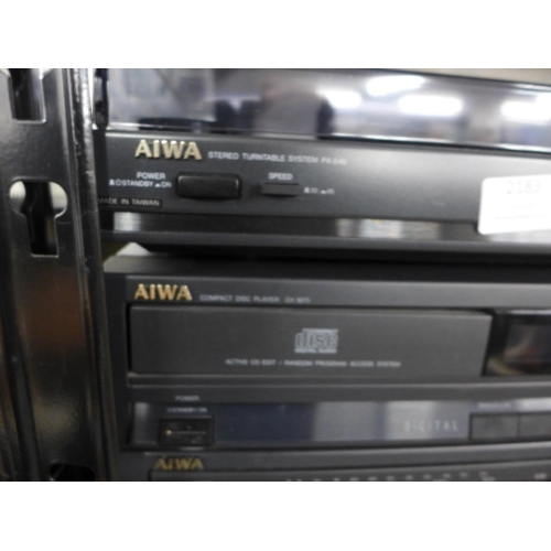 2183 - An Aiwa X-35 stereo system including record deck, CD player, radio with speakers and tape player