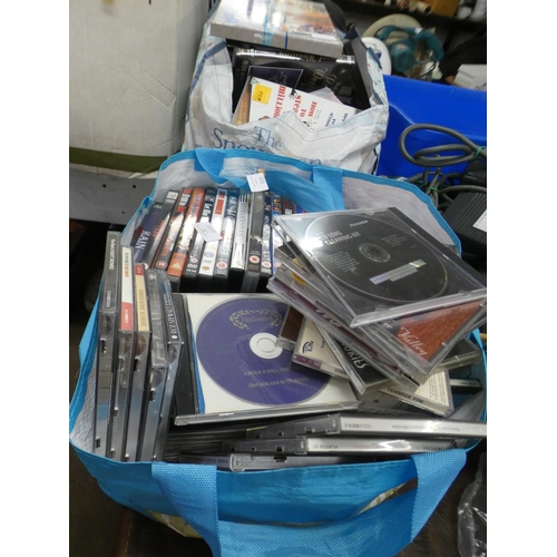 2315 - Samsung DVD player with 2 bags of assorted DVDs and CDs