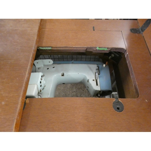 2354 - Jones sewing machine - in case with pedal