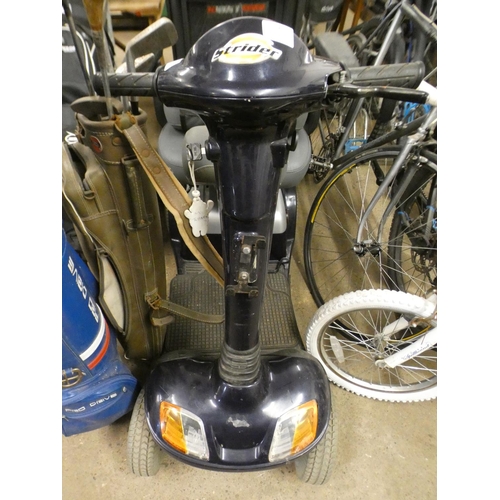 2373 - Strider four-wheel mobility scooter with charger and key - W