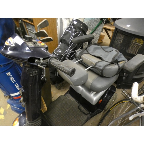 2373 - Strider four-wheel mobility scooter with charger and key - W