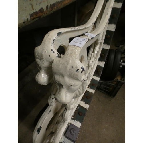 2400 - Pr. of cast metal lion bench ends