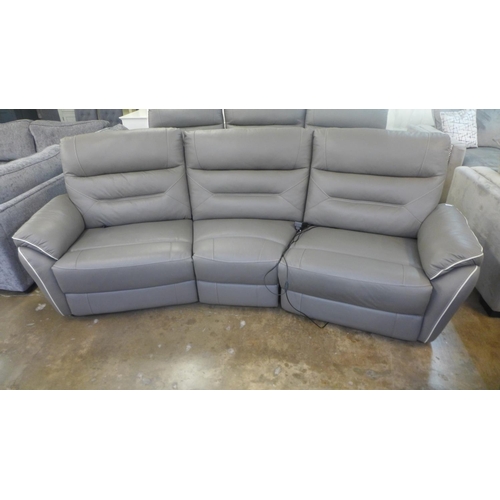 1996 - A Raffa grey leather electric reclining four seater sofa - damaged plug