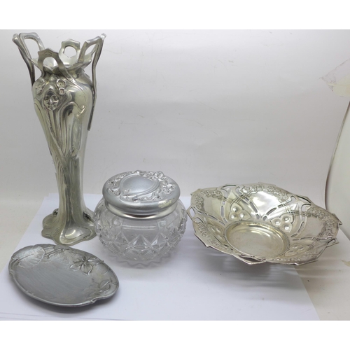 626 - An AE Williams cast pewter Art Nouveau vase, two dishes and a lidded glass pot