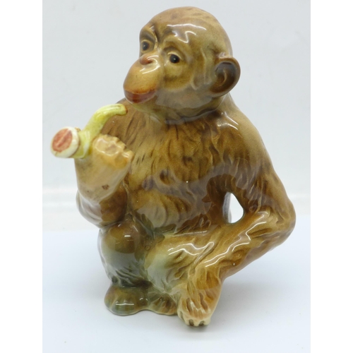 668 - A Beswick figure of a pipe smoking chimpanzee, 1049 backstamp, chip to base