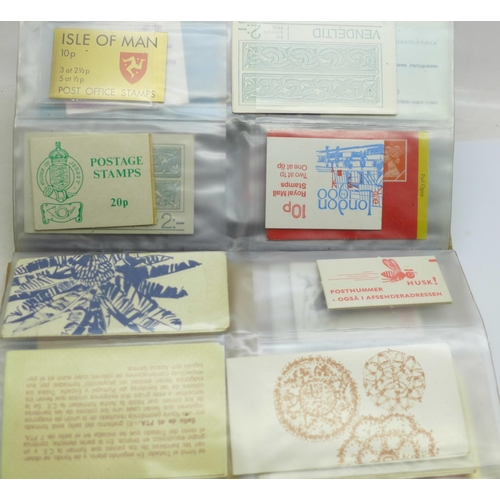 669 - An album of decimal and pre-decimal stamp booklets, mainly UK, 47 in total