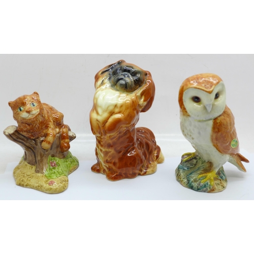 671 - Three Beswick figures; Barn Owl, Pekinese dog and Cheshire Cat