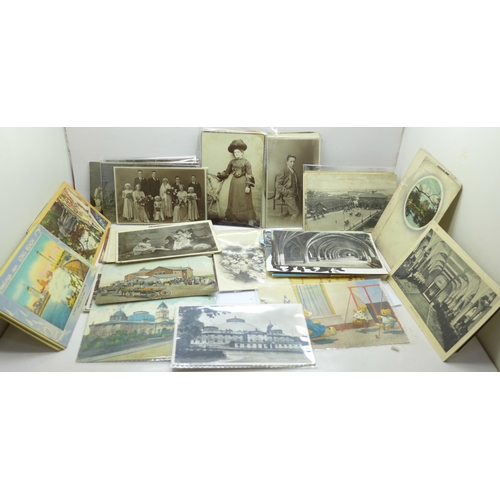 672 - A collection of vintage postcards and photographs, including Victorian and Edwardian