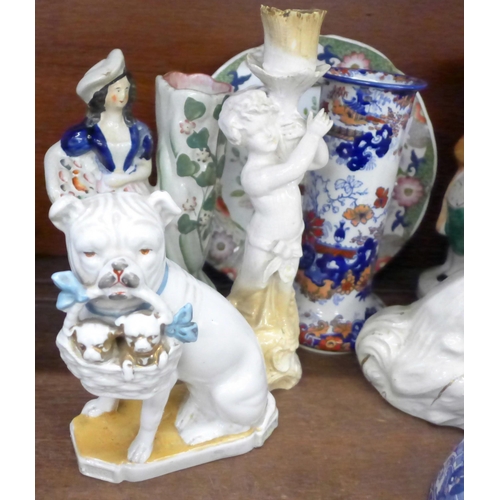 705 - A collection of china including an Edward VII cup with portrait in the base, a Staffordshire Toby ju... 