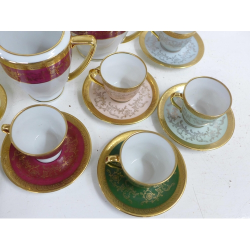 713 - Six Limoges coffee cups and saucers, a three piece tea service and an oval trinket pot
