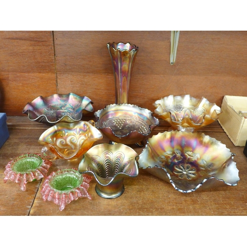 714 - Seven items of carnival glass and a pair of coloured glass dishes