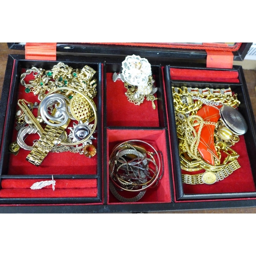 715 - A jewellery box and costume jewellery