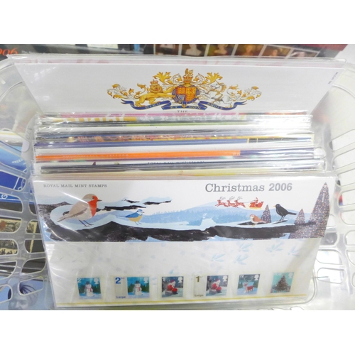 719 - A collection of Royal Mail mint stamp packs, 65+