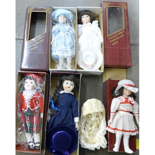 725 - A collection of porcelain fashion dolls