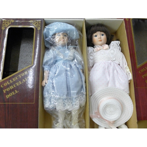 725 - A collection of porcelain fashion dolls