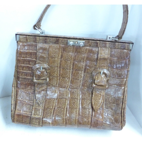 727 - A Lulu Guinness handbag, a crocodile skin handbag and one faux