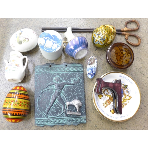 728 - A collection of china including a miniature Wedgwood teapot, a pair of ironing tongs and a Royal com... 