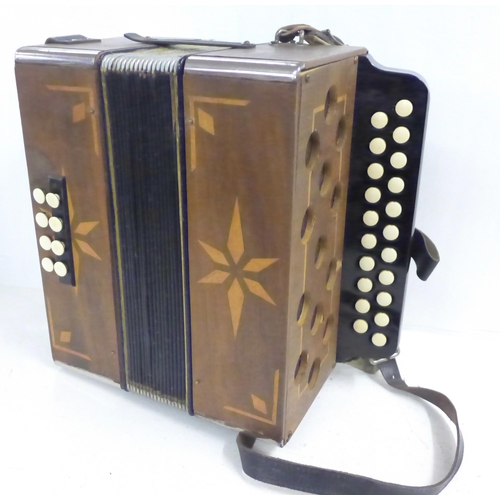 738 - A button accordion