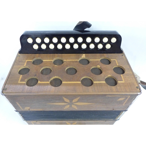 738 - A button accordion