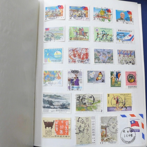 744 - Four albums of stamps
