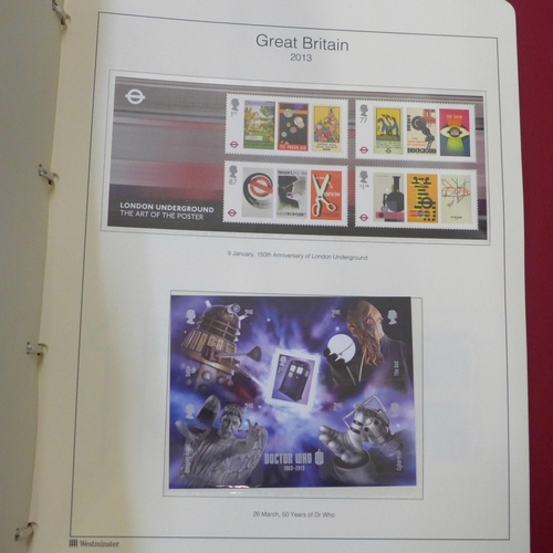764 - An album of Great Britain stamps and another book of stamps including errors