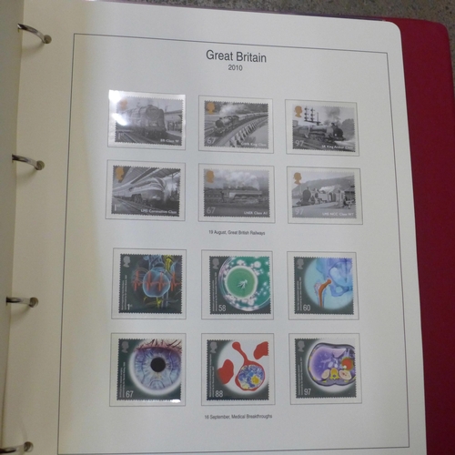 764 - An album of Great Britain stamps and another book of stamps including errors