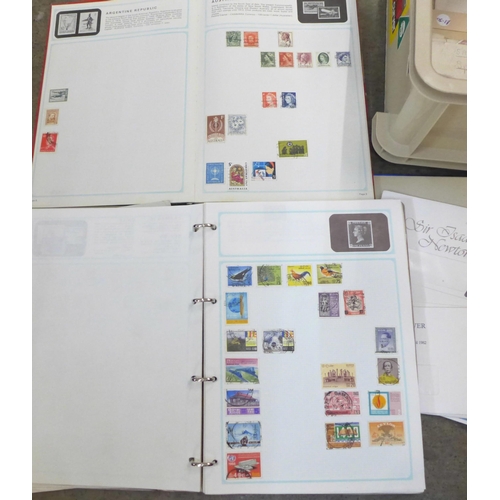 766 - Two albums of world stamps, an album of cigarette cards and first day covers