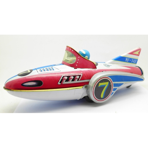 778 - A tin-plate rocket car, made in China