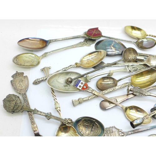 790 - A cabinet of collectors spoons and other silver and plated collectors spoons, weight of hallmarked s... 