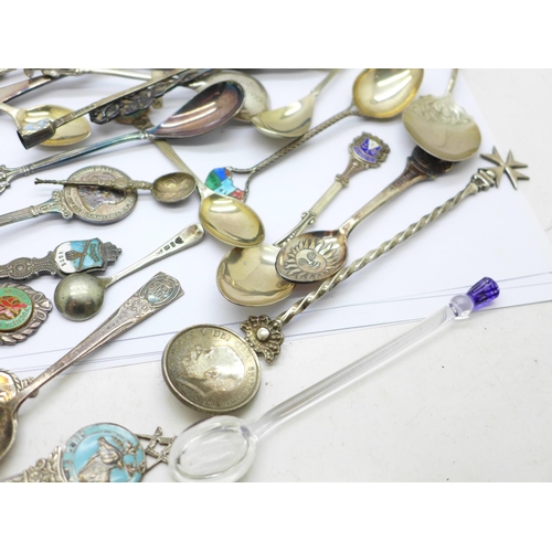 790 - A cabinet of collectors spoons and other silver and plated collectors spoons, weight of hallmarked s... 