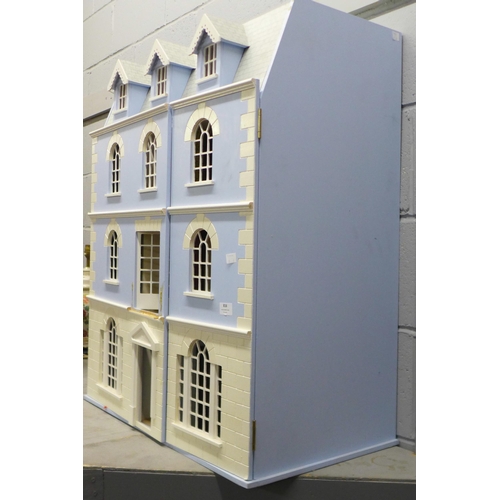 816 - A large doll's house with contents