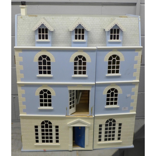 816 - A large doll's house with contents