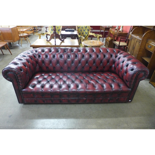 1 - A Chesterfield red leather settee