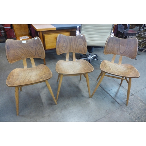 106 - A set of three Ercol elm and beech 401 model Butterfly chairs