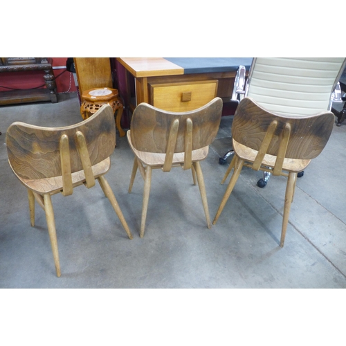 106 - A set of three Ercol elm and beech 401 model Butterfly chairs