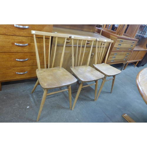 107 - A set of three Ercol elm and beech 608 model chairs