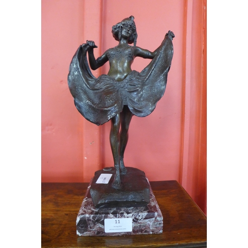 11 - An Art Deco style bronze figure of a dancing girl, on marble socle