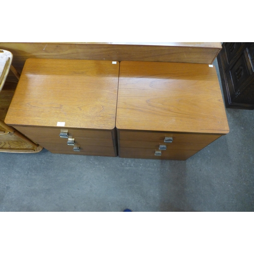 122 - A pair of Stag teak bedside chests