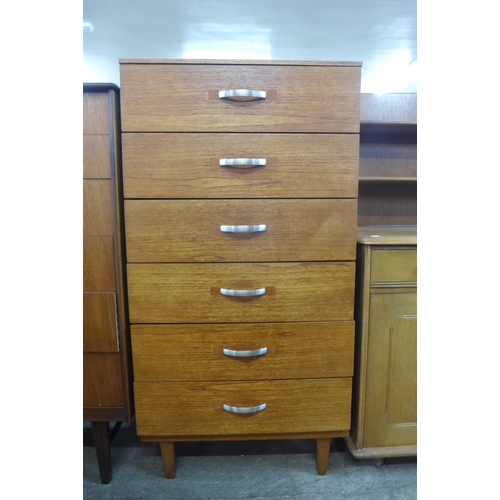 140 - A teak chest of drawers
